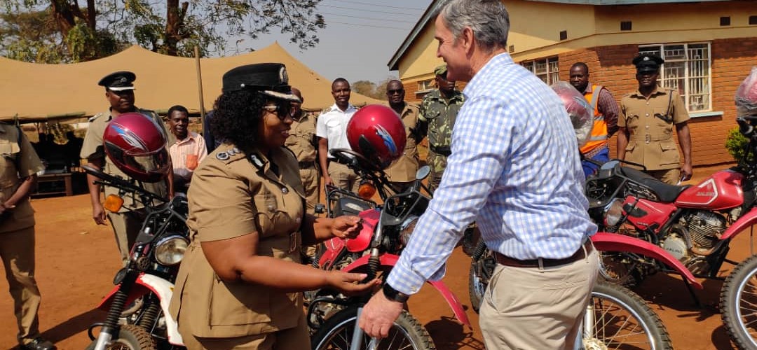 McAlpin handing over  keys for the motorcycles to the Officer-In-Charge, Msonkho